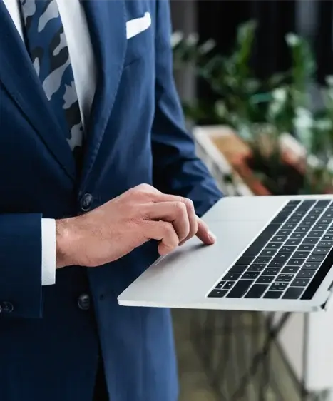 Picture of a business man with a laptop