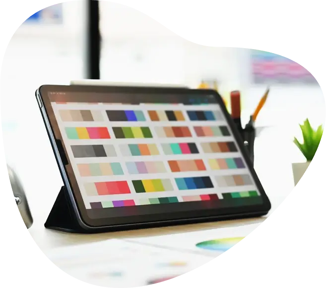 Picture of a tablet showing many different color schemes for a website